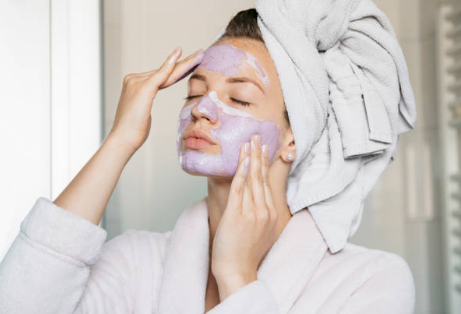 A woman receives a hydrating beauty treatment.